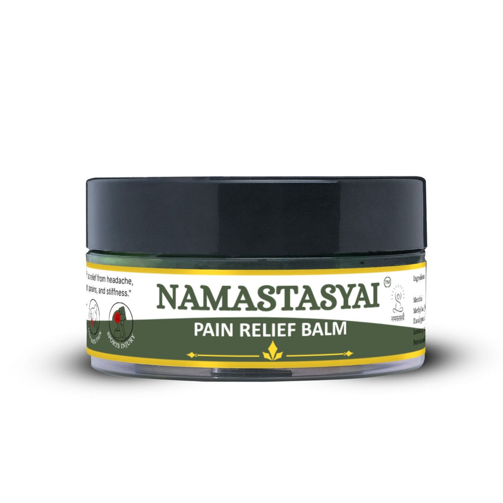 Namastasyai Pain Relief Balm in a clear plastic jar with a black lid and a green and yellow label, shown on a white background with a soft shadow.